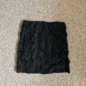 Black floral appliqué mini skirt